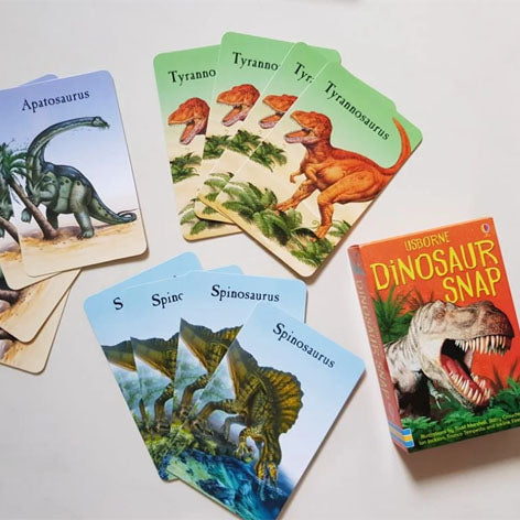 usborne toys snap cards in dinosaur theme with tyrannosaurus rex, spinosaurus, apatosaurus and more